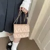 Bolsa feminina estilo Chanel 2026 nova bolsa de mão acolchoada transfronteiriça bolsa de ombro com corrente versátil bolsa crossbody atacado