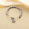 Pulsera de cuentas redondas de turquesa con cuentas de cristal blanco de moda diseño literario joyería de cuentas para mano de dama nicho venta al por mayor