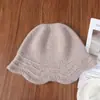 Venta al por mayor transfronteriza del fabricante, Gorro de pescador cálido de punto 100% lana pura con borde de encaje, Gorro de lana cálido de punto en stock