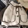 ¡Grueso y con estilo! Chaqueta de lana de cordero coreana con solapas para bebé 2026 Invierno Moda Infantil Abrigo de algodón grueso
