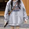 Sudadera gris para mujer, de longitud media, cubre las caderas, combinada con pantalones de tiburón, con capucha, nuevo estilo 2026, moda coreana, adecuada para figuras petite.