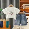Camiseta de Manga Corta para Niños Estilo Nuevo de Verano para Niños 2026 Bebé Color Sólido Estampado de Dibujos Animados Cuello Redondo Ropa para Niños Conjunto de Dos Piezas