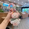 Nuevo pastel de camiseta a rayas creativas falda de gasa oso de peluche de dibujos animados llavero de coche adornos de bolsa de muñeca lindos
