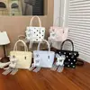 Bolsa de bolinhas de verão transfronteiriça super popular de nicho para mulheres 2026 nova moda versátil bolsa transversal bolsa de mão para o trabalho bolsa feminina