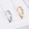Anillo con patrón de espiral de nuevo estilo de moda europea y americana inspirado en Chanel, anillo de moda de alta gama de nicho para mujer de cobre puro, superventas transfronterizo