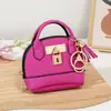 Nuevo Llavero Mini Bolso de Concha Portátil para Guardar Labial Auriculares Bolsita Colgante de Monedero de Mano