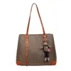 Bolsa de Hombro Retro de Tela Oxford Súper Popular Transfronteriza para Mujer Primavera 2026 Gran Capacidad Casual Retro para Hombro/Axila