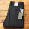 Pantalones de Verano Europeos Finos de Hilo de Secado Rápido Elásticos en Cuatro Direcciones para Hombre de Gama Alta Cómodos de Cintura Media Pierna Recta Casual de Negocios