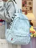 Mochila de estilo coreano de nicho con estampado de estrellas para estudiantes de secundaria y preparatoria, modelo nuevo 2026, mochila estilo bosque para estudiante universitario
