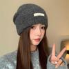 Gorro de punto de otoño e invierno con diseño de nicho de Corea del Sur para mujer, suave, ceroso, cálido, pequeño, de lana para parejas, combina con todo.