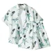 Camisa floral de manga corta, Ropa de playa de Hainan, Estilo hawaiano de Sanya, Conjunto de pantalones cortos finos de verano para hombre y pareja de viaje a Tailandia