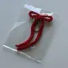 2026 Amazon Transfronterizo Nuevo Modelo Crochet Hecho a Mano Puro Lindo Fresco Colgante Llavero Lazo Venta al por Mayor