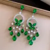Aretes de Aguja de Plata con Mariposa Redonda Incrustada de Diamantes y Borlas de Gota de Agua, Lujo Ligero y Sensación de Alta Gama, Aretes Exquisitos con un Diseño Único