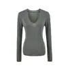 Suéter de punto simple con cuello en V y manga larga, nuevo estilo de otoño, versátil, corte ajustado, camisa base de color liso para usar en capas