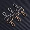 Hebilla de metal para bolso de mujer, accesorio directo de fábrica, con forma de perro, llavero, gancho, 38 mm, cola de Dan