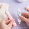 Los fabricantes de Tiangao suministran cinturón corrector de garras de gato, lindo, estilo corazón de niña, cinturón corrector para estudiantes, mini gato, cinturón corrector de doble cabeza