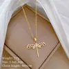 [acero de titanio] portando libélula de diamantes completos vacía temperamento de lujo ligero hermoso collar de diamantes completos cadena de clavícula versátil para mujer cadena de acero de titanio