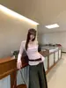 Camiseta feminina de manga longa estilo coreano com gola halter e decote drop, modelagem slim, novo top elegante estilo coreano para o outono, ideal para o trabalho.