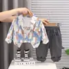 Conjunto de chaqueta tie-dye de manga larga para niños de primavera y otoño de comercio exterior, conjunto ligero de tres piezas para niños pequeños y niños pequeños, venta al por mayor