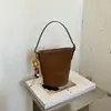Bolso de hombro tipo cubo casual y sencillo para mujer, nuevo bolso de moda 2026 con textura para llevar al hombro o cruzado, bolso de mano para el trabajo, moderno