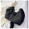 Bolso de mezclilla para mujer, gran capacidad, nuevo modelo 2026, bolso de hombro versátil con cadena para cruzar el cuerpo, bolso de tela con un toque de alta gama, bolso tote