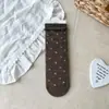 Calcetines retro de color caramelo hasta la pantorrilla para mujer, otoño e invierno, algodón puro, sin costuras, con un dulce lazo y diseño de lunares, modernos y elegantes