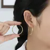 Venta caliente europea y americana moda exagerada acero inoxidable aretes redondos simples y texturizados diseño de alta gama joyería para orejas al por mayor