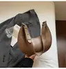 Bolsa de Ombro Único Texturizada de Alta Qualidade Formato Meia-Lua 2026 Nova Tendência Simples Versátil Bolsa de Axila Bolsa Pequena Casual para Comute para Mulheres