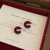 Aretes de Bola de Pelo con Lazo Rojo Ankora para Nochevieja, Exquisitos Retro, Simples, de Gama Alta y Versátiles, Pendientes Elegantes