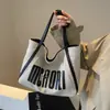 Bolsa de Lona Tote para Mujer de Gran Capacidad Nueva 2024 Bolso Portátil de Nicho Bolso de Hombro para Estudiante Universitario Bolso para Ir a Clase