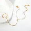 Pulsera de acero inoxidable con perlas entrelazadas, nicho transfronterizo, lujo ligero, joyería versátil y de alta gama para niñas, venta al por mayor