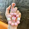 Nueva y creativa cadena para teléfono móvil de muñeca pequeña, llavero, colgante, lindos accesorios para bolso, llavero de coche, regalo, venta al por mayor