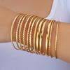 Pulsera ancha exagerada de personalidad retro transfronteriza de Europa y Estados Unidos, traje, pulsera irregular lisa dorada, juego de pulseras de varias piezas