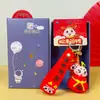 2025 Año de la Serpiente Tendencia Nacional Creativo Pequeña Serpiente de la Suerte Llavero Caja de Regalo Lindo Bolso Llavero Colgante Venta al por Mayor Pequeños Regalos