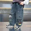 Roupas Infantis para Meninos Primavera e Outono Calça Jeans Estilo Coreano Calça Casual Tendência Bonita Grafite para Crianças Calça Longa de Bebê Comércio Exterior