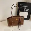 Bolso de axila retro francés transfronterizo para mujer, nuevo bolso de hombro de nicho de moda 2026, bolso versátil de gran capacidad para el día a día