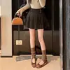 Falda corta plisada de lana para mujer 2026 Otoño Invierno Nuevo Estilo Falda de lana línea A Cintura Alta Pantalones cortos anti-exposición Falda midi plisada para mujer