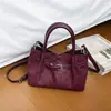 Bolso de trabajo de otoño e invierno para mujer, nuevo bolso de hombro retro de moda 2026, bolso cruzado de gamuza