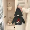 Suéter Outono/Inverno para Meninas 2026 Novo Estilo Bordado Cartoon Bebê Jacquard com Capuz Engrossado Tricô Estilo Coreano