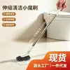 Escova de limpeza extensível para uso doméstico, projetada para limpar frestas de janelas e pisos, com corpo estreito e cabo longo, ideal para banheiros e outras áreas com espaços apertados.