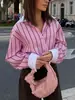 Camisa versátil de moda casual vintage al por mayor de comercio exterior europeo y americano con puños a rayas y colores contrastantes
