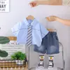 Elegante Conjunto de Verano para Bebé Niño 2026 Nuevo Estilo Coreano Camisa con Corbata de Manga Corta Conjunto de Dos Piezas Ropa para Bebés y Niños