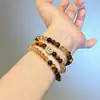 Pulsera de cristal amarillo tipo torre, diseño original para mujer, pulsera de cristal con cuentas de ojo de tigre amarillo de doble hilo, al por mayor