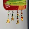 Hombre de jengibre navideño Cadena para teléfono móvil con borla de árbol de Navidad Nicho DIY Cordón para teléfono móvil de aspecto elegante Colgante de cuentas Regalo
