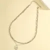 Europa y Estados Unidos diseño de moda transfronterizo sentido redondo colgante de marca collar personalidad femenina hip hop estilo punk cadena de clavícula para hombre venta al por mayor