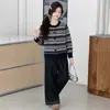 Conjunto de dos piezas de suéter de punto para niñas, nueva colección de otoño 2026, elegante y casual conjunto de cárdigan a rayas y pantalones de pierna ancha para niños mayores