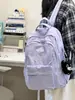 Mochila ligera para estudiantes para niñas, gran capacidad, mochila multicapa para estudiantes de secundaria y preparatoria, mochila casual de color sólido para viajes de mujeres