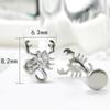 Pendientes de titanio Jiang F136 de titanio con escorpión y circonita, fabricantes transfronterizos, joyería para perforaciones corporales de aleación de titanio G23, clavos para el cartílago de la oreja