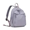 Mochila para Mujer 2026 Nuevo Estilo Viaje Tela de Nylon Ligera Pequeña Versátil Moderna Color Sólido Estudiante Mochila Escolar