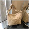 Bolsa de grande capacidade feminina 2024 novo estilo coreano nicho viajante arco faculdade estudante classe bolsa de ombro bolsa crossbody